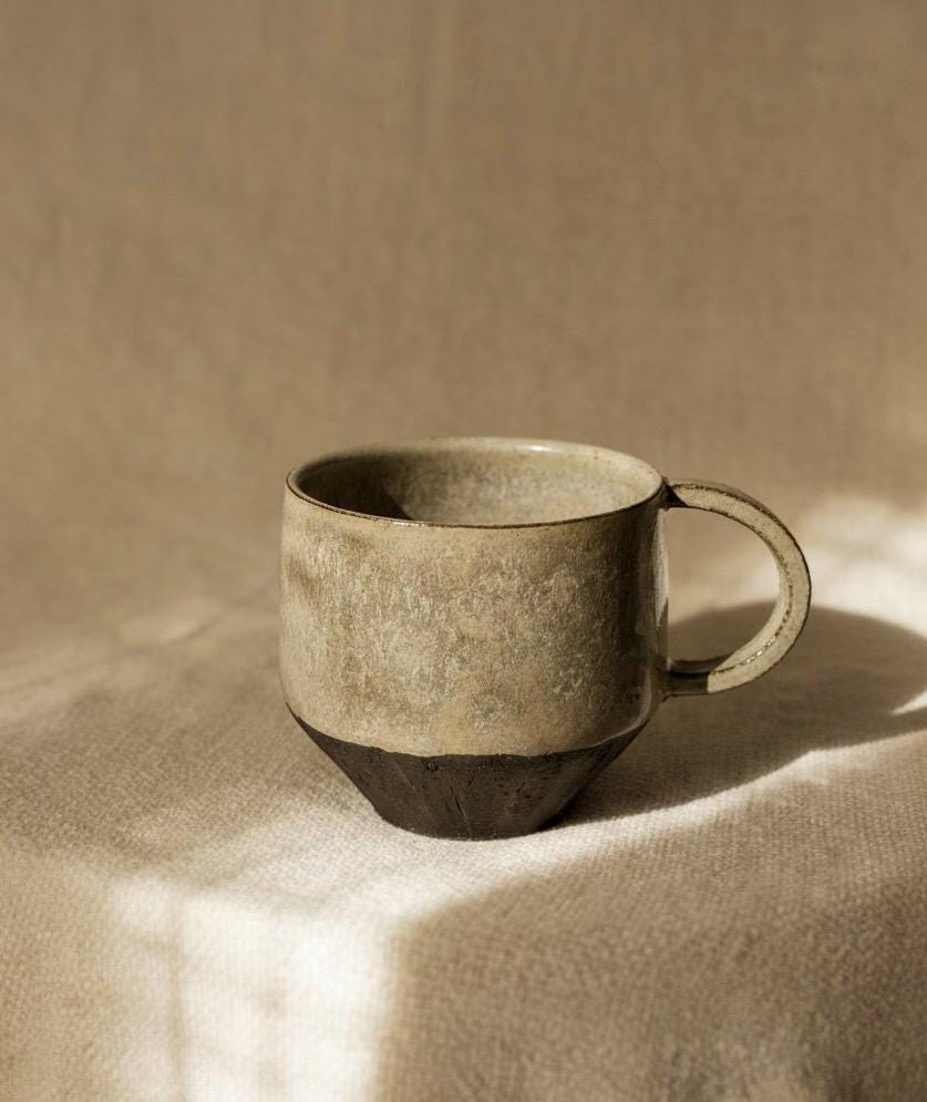 Handmade Stoneware Coffee Mug: Rustic Ceramic Pottery, Eclipse Eye Design